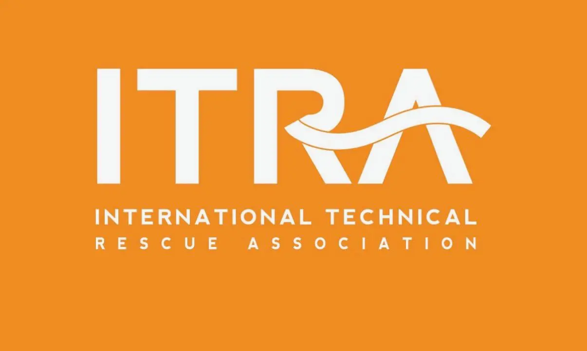 White ITRA letters with wave on orange